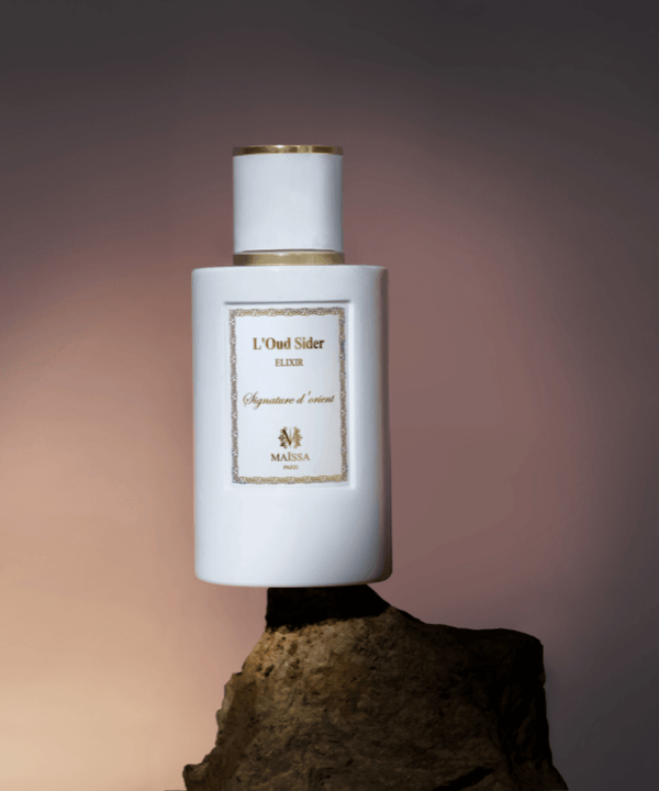 Luxurious Maison Maïssa L'Oud Sider perfume bottle exuding elegant, exclusive floral and woody fragrance, available at the5thscent.