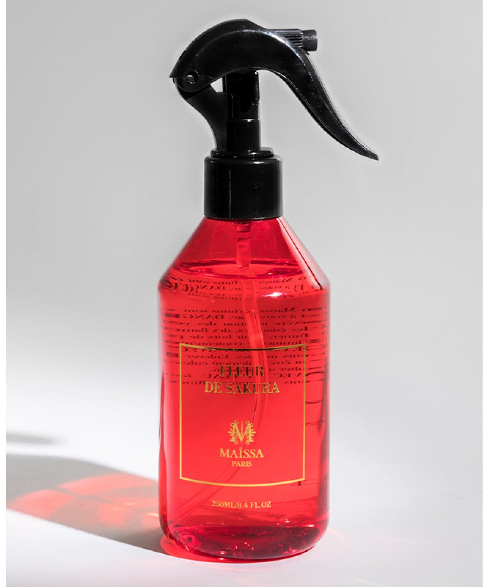 Elegant LINEN & HOME FRAGRANCES FLEUR DE SAKURA by Maison Maïssa, featuring a luxurious floral and amber essence, available at the5thscent.