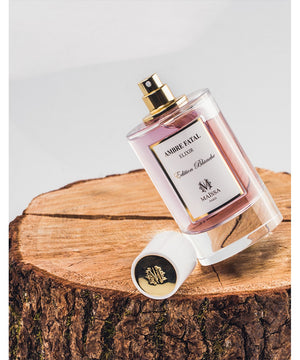 Luxurious AMBRE FATAL perfume by Maison Maïssa, featuring elegant floral and amber notes. Available at the5thscent. Unisex fragrance.