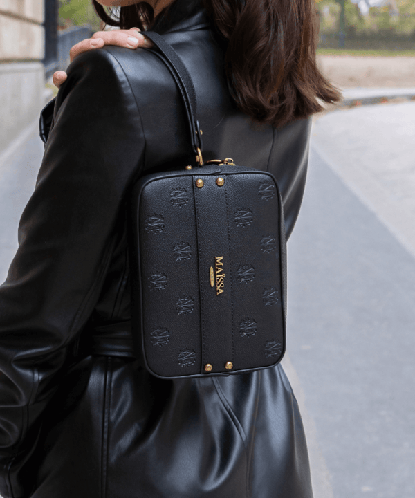 Luxurious Pochette Toscane from COFFRET TOSCANE 66 AVENUE by Maison Maïssa, featuring elegant black leather with gold signature, via the5thscent.