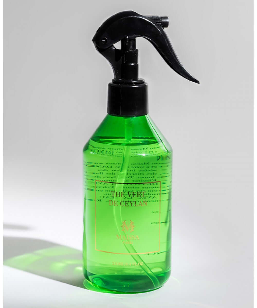 Elegant Maison Maïssa LINEN & HOME FRAGRANCES THE VERT DE CEYLAN, a luxurious floral and musk scent, by the5thscent, in a green bottle.