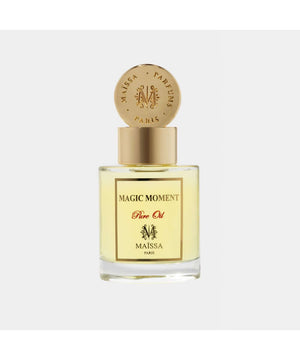Luxurious PURE OIL MAGIC MOMENT perfume by Maison Maïssa in an elegant glass bottle, featuring a woody and sweet fragrance by the5thscent.