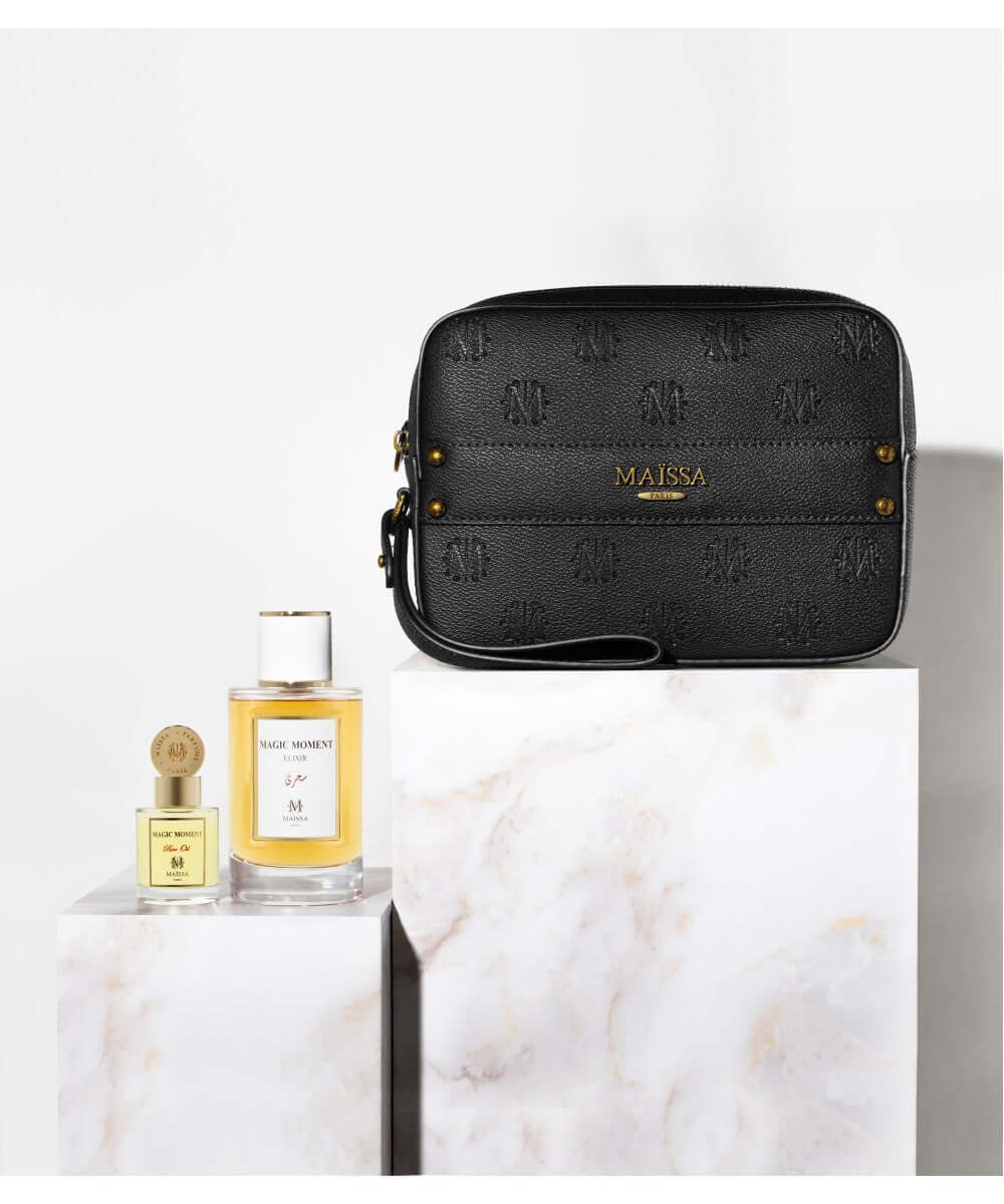 Luxurious COFFRET TOSCANE MAGIC MOMENT by Maison Maïssa featuring elegant Pochette Toscane and Eau de Parfum blending floral and woody notes.