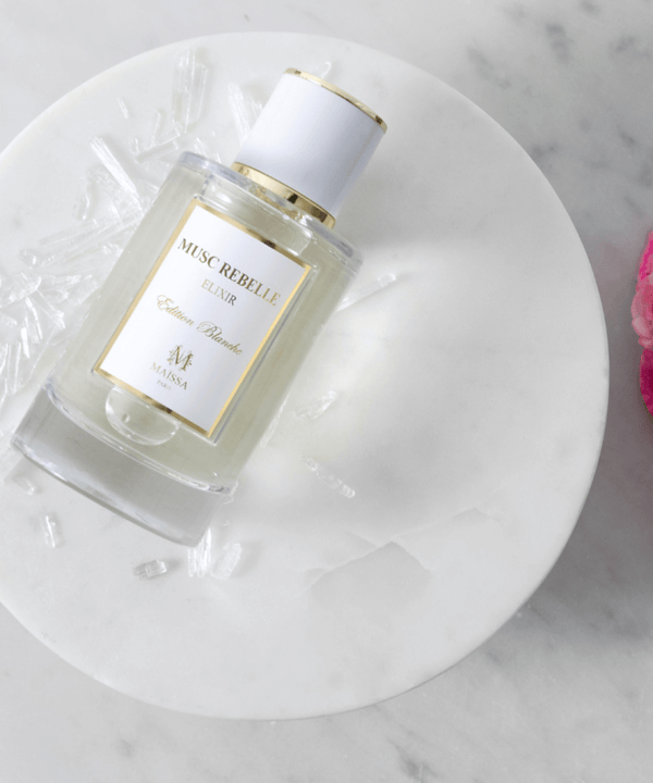 Luxurious bottle of MUSC REBELLE by Maison Maïssa and the5thscent, a unisex floral musk fragrance exuding elegance and exclusivity.