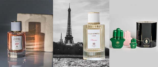 Jo Malone perfume bottles, including a floral fragrance with Eiffel Tower background and scented candles in green and pink holders