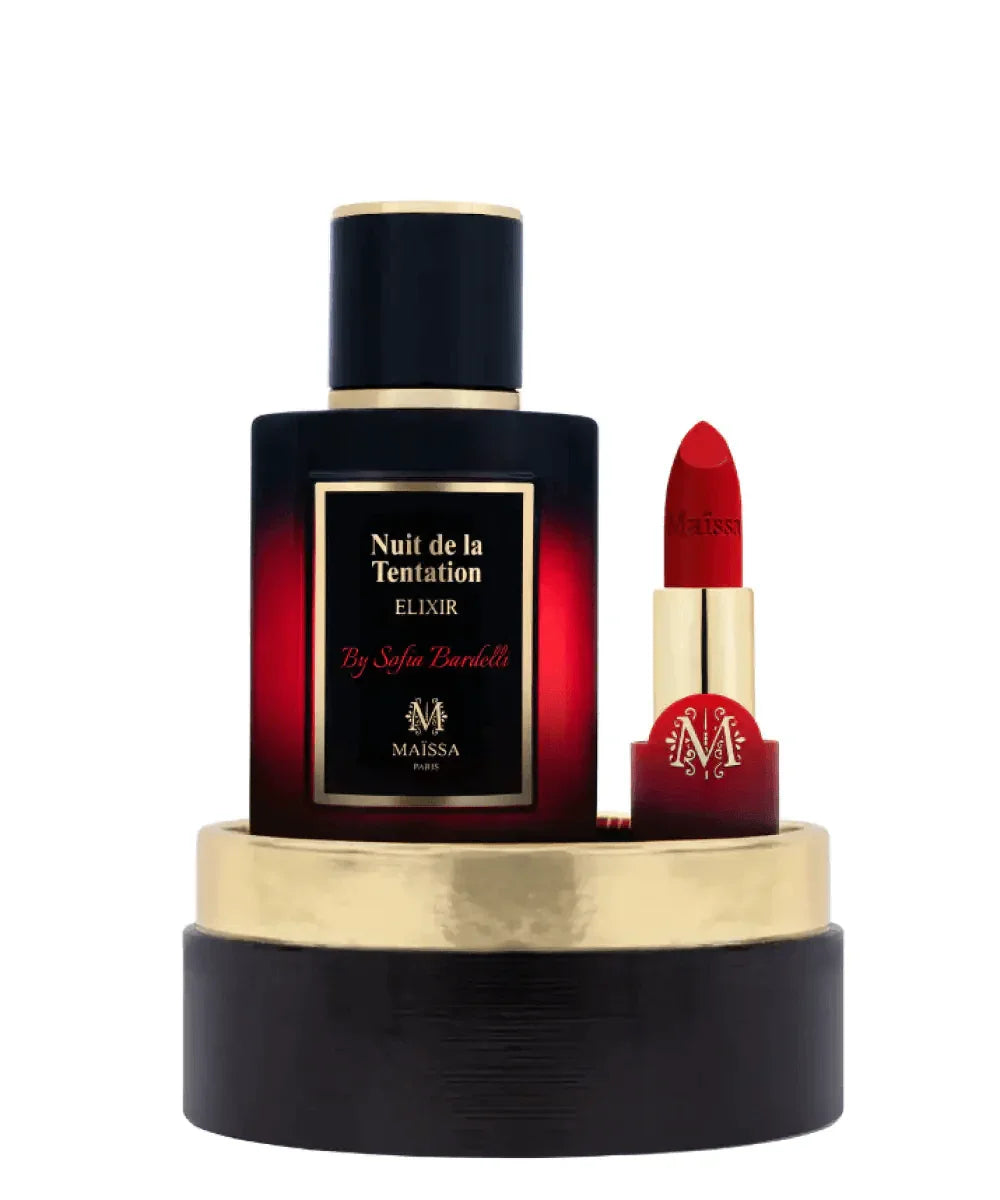 Nuit de la Tentation elixir perfume bottle and red Maissa lipstick on black and gold display