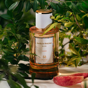 Maïssa Jardin de Babylone Jasmine bottle in a botanical setting