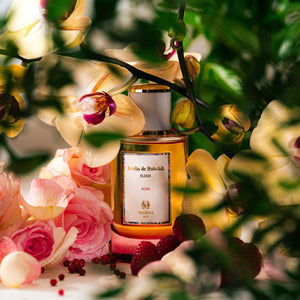 Maïssa Jardin de Baltchik Rose Elixir among pink roses and orchids