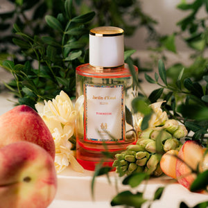 Maïssa Jardin d’Essai Tuberose Elixir among white flowers and peaches