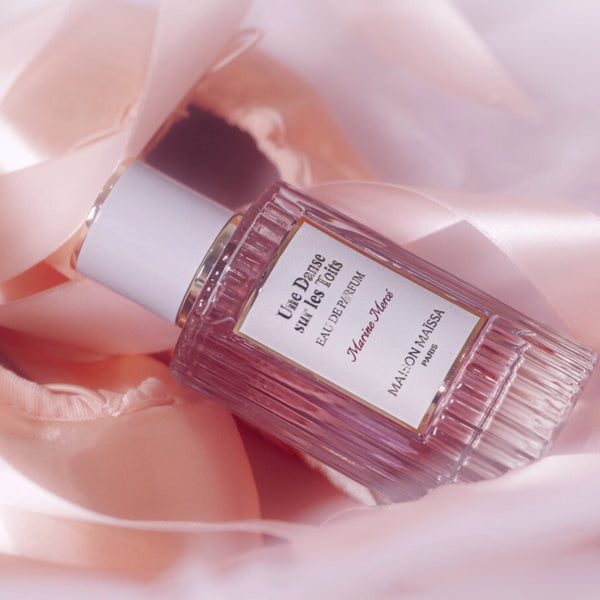 Maison Maïssa Une Danse sur les Toits perfume bottle in a soft pink luxury setting