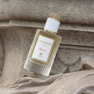 Maison Maïssa Ville Lumière Elixir perfume bottle in a Parisian stone setting