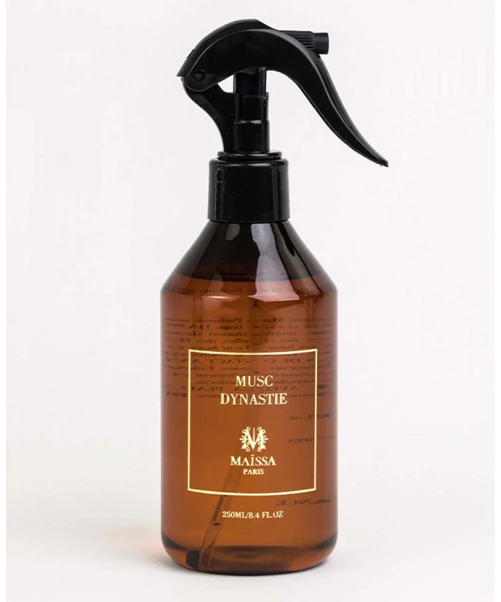 Amber spray bottle labeled Maissa Dynastie with black trigger nozzle, 250ml, on white background