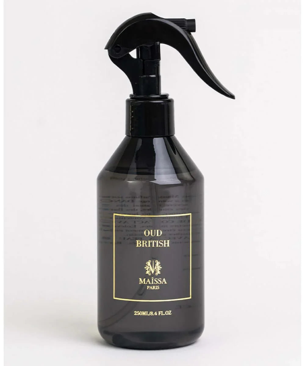 Black spray bottle labeled Oud British by Maissa Paris, 250ml, on white background