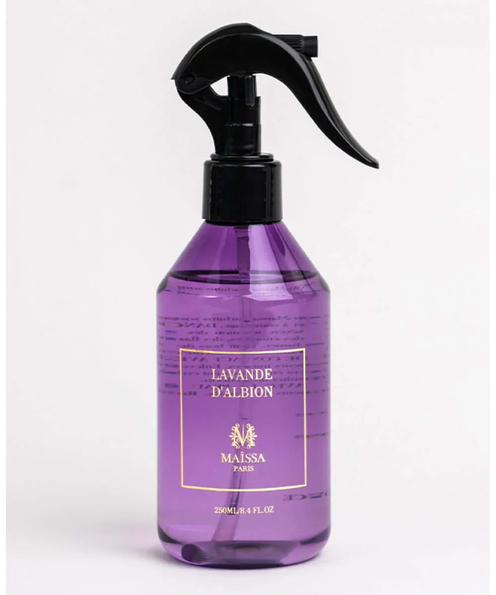 Purple spray bottle labeled Lavande D'Albion with black trigger nozzle on white background