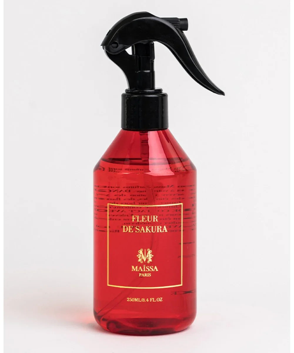 Red spray bottle of Fleur de Sakura by Maissa Paris with black trigger, 250ml, on white background