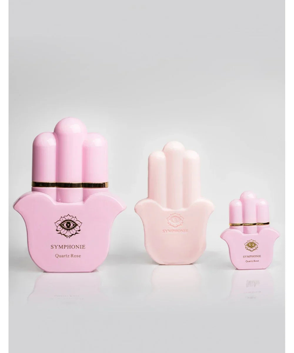 Symphonie Quartz Rose perfume set with pink hand-shaped bottles and black Swarovski crystal edition box