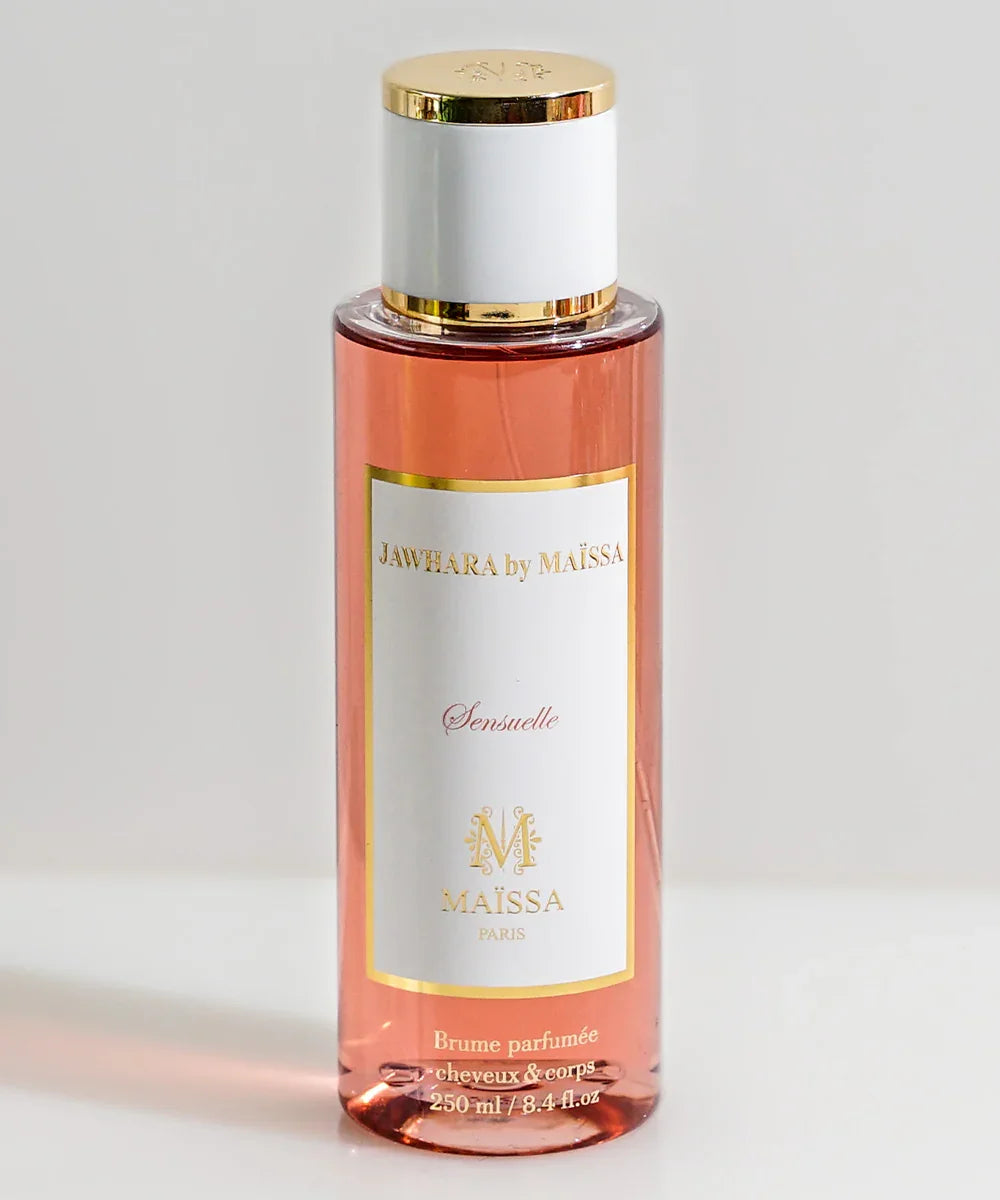 Jawhara by Maïssa Sensuelle scented body and hair mist in a clear pink bottle with gold and white cap