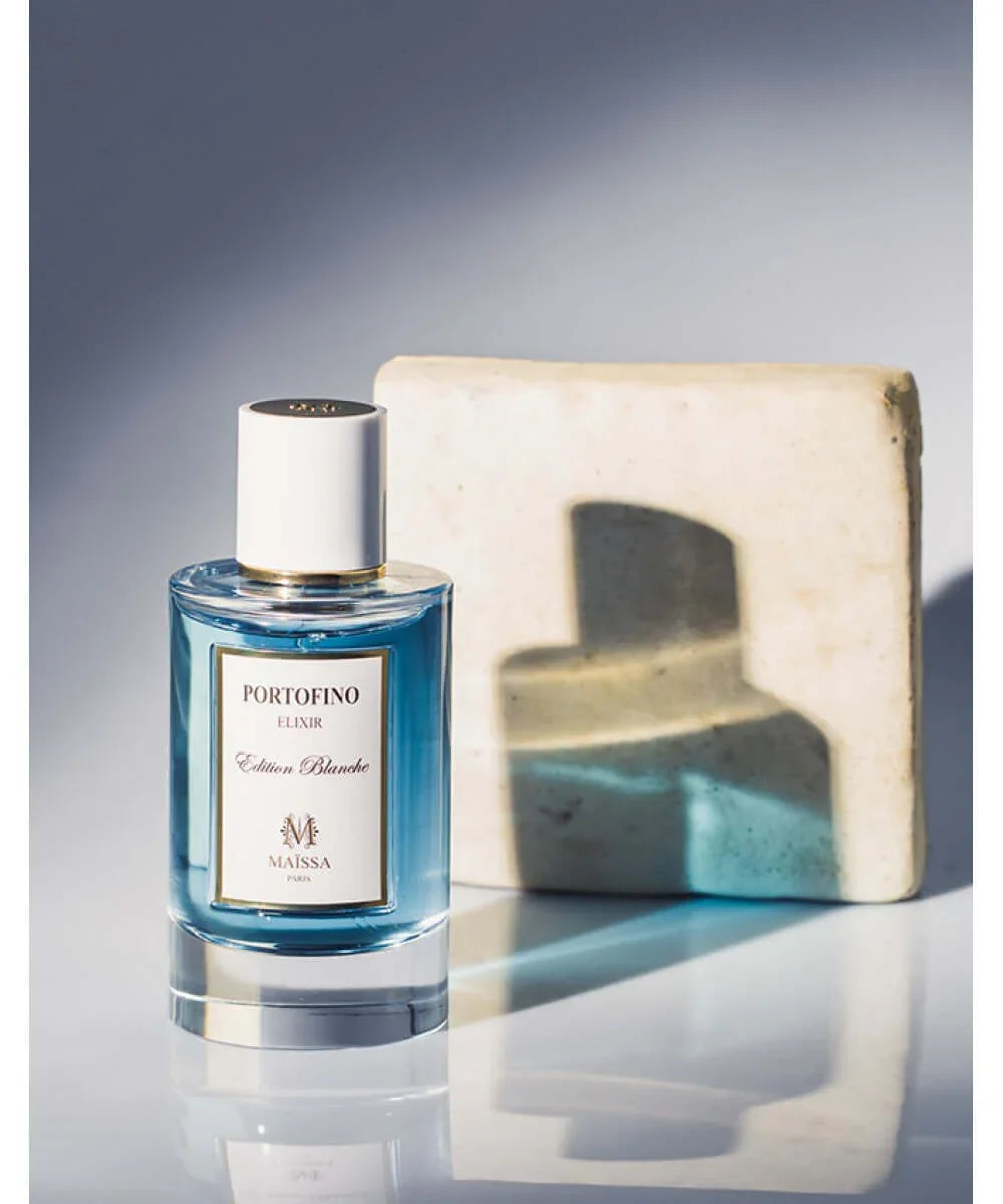 Portofino Elixir Edition Blanche blue perfume bottle by Maïssa Paris with white and gold label