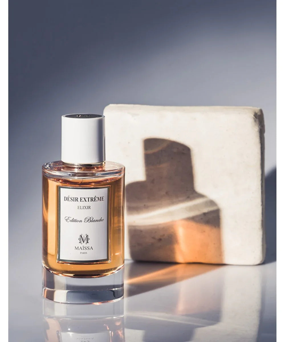 Maïssa Paris Désir Extrême Elixir Edition Blanche perfume bottle with amber liquid