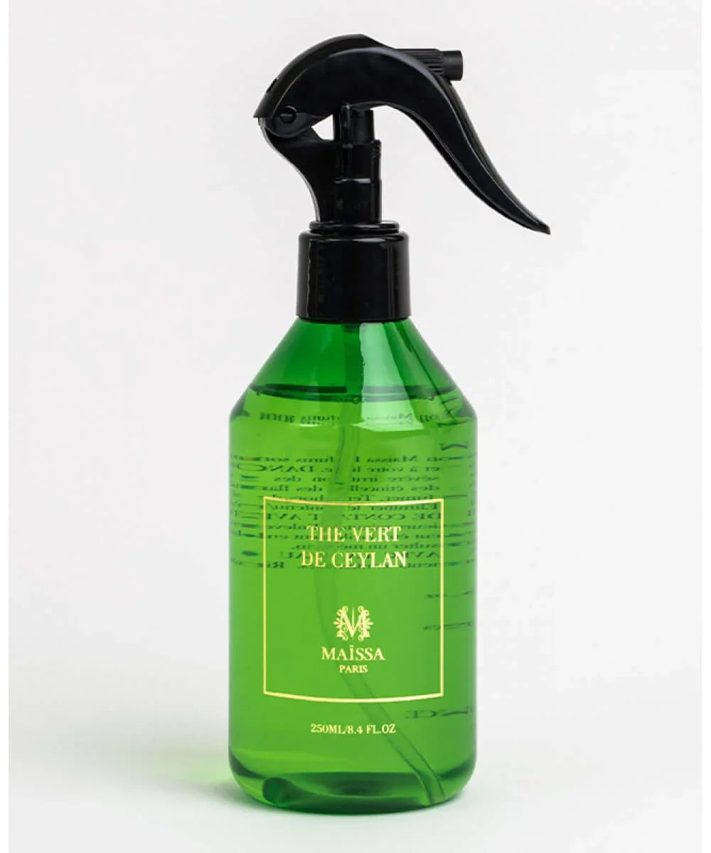Green spray bottle labeled The Vert de Ceylan by Mansa with black trigger top