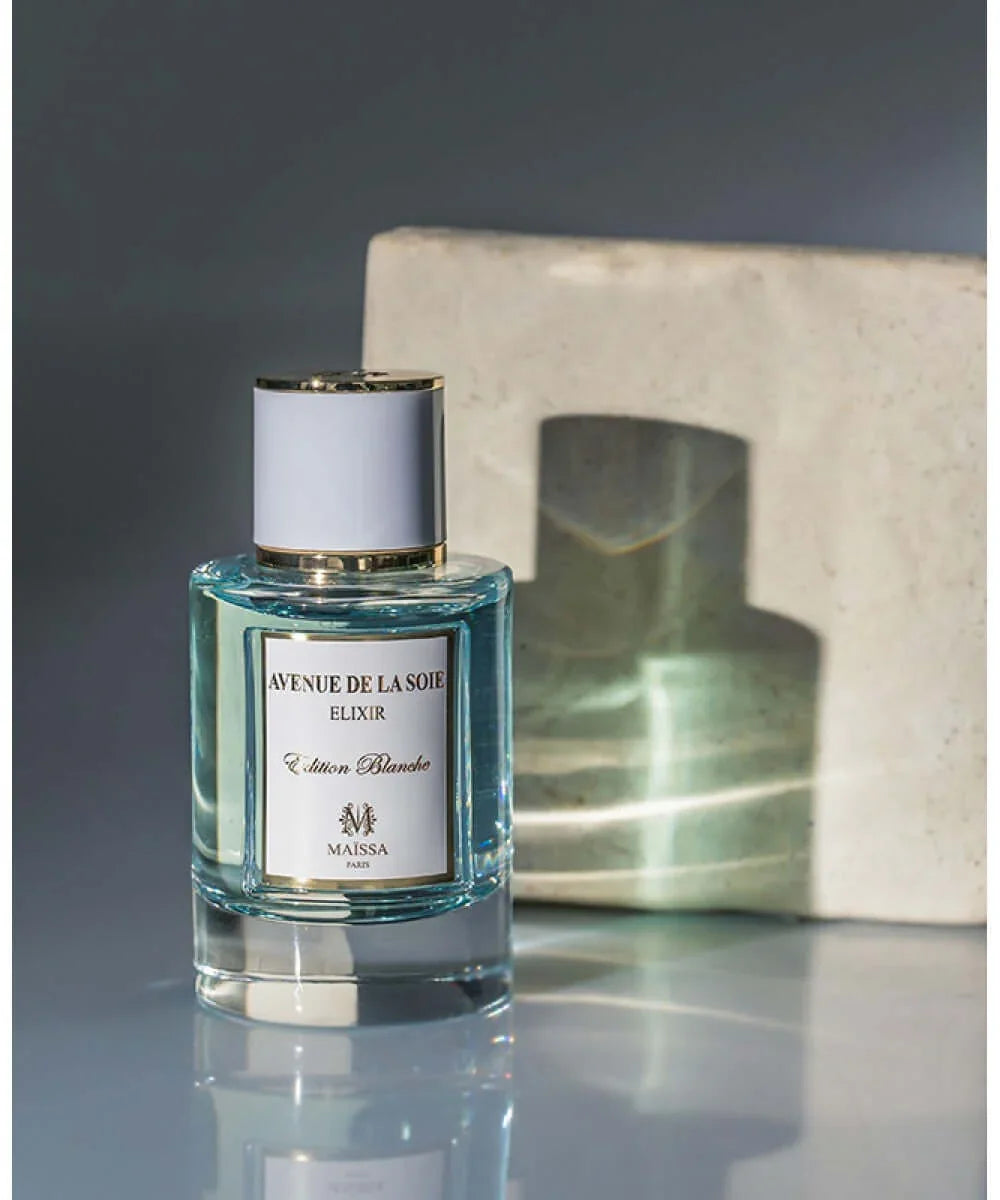 Avenue de la Soie Elixir Edition Blanche perfume bottle by Maissa Paris with gold accents