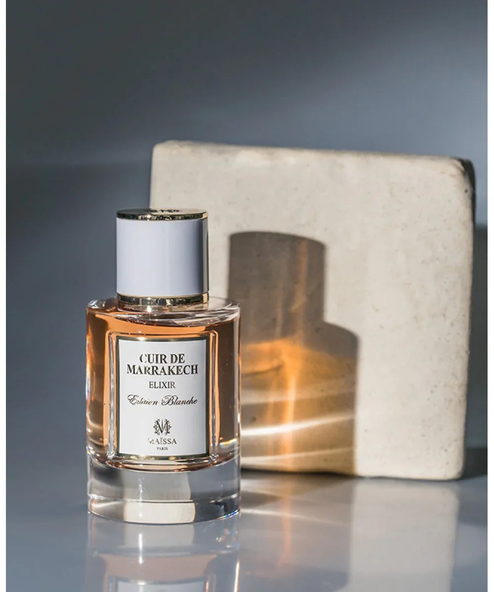 Cuir de Marrakech Elixir Edition Blanche perfume bottle by Maissa Paris with gold and white accents