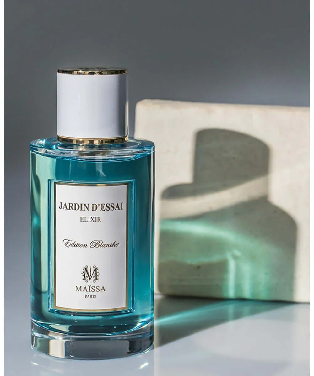 Jardin d'Essai Elixir Edition Blanche blue perfume bottle by Maïssa Paris with white and gold cap