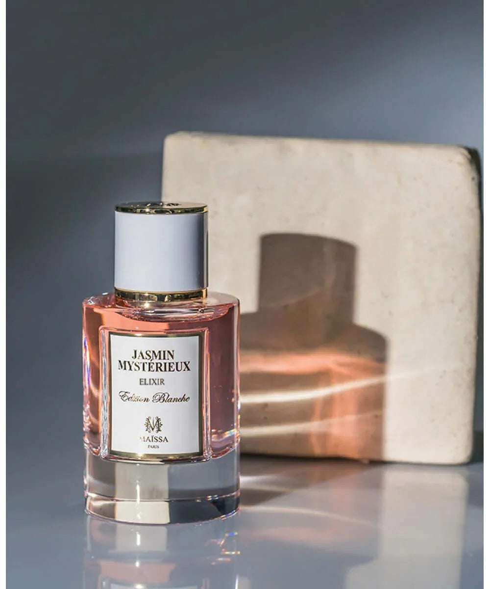 Jasmin Mystérieux Elixir Edition Blanche perfume bottle by Maïssa Paris with pink liquid
